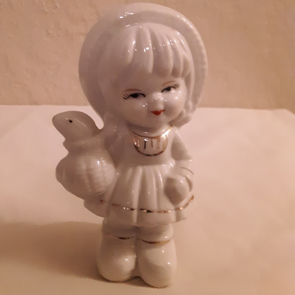 Porcelain Eskimo Girl with a Fish Hand Painted Figurine